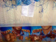 تابلو فرش چهره سفارشی در حال بافت روی دار قالی